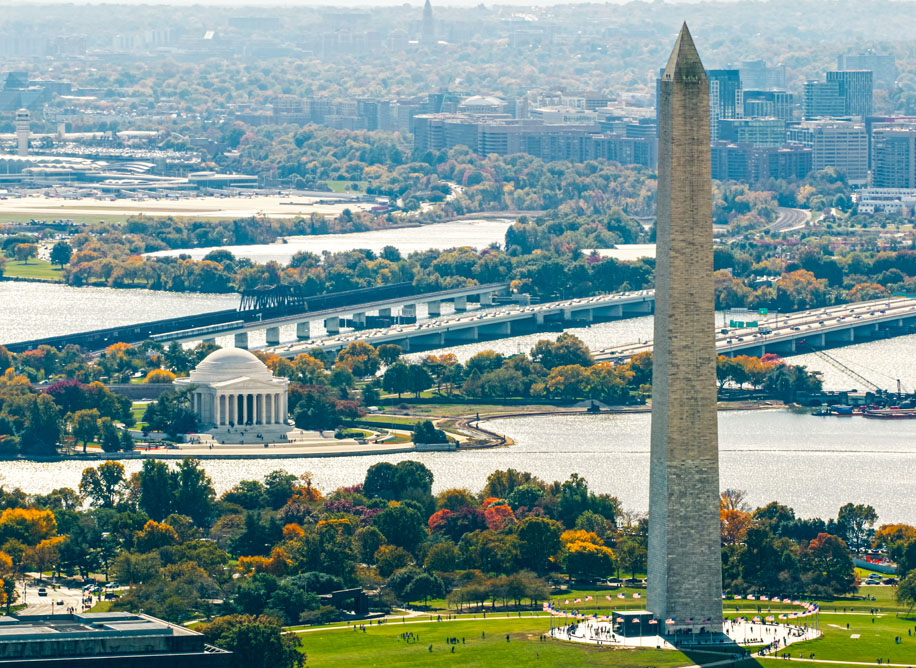 Washington Monument with Potomac River and bridges behind it